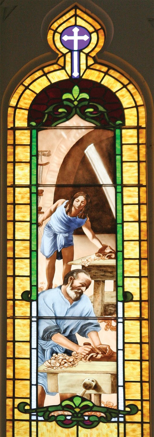 Stained glass depicting St. Joseph and Jesus at work, in St. Joseph Church in Palmyra.